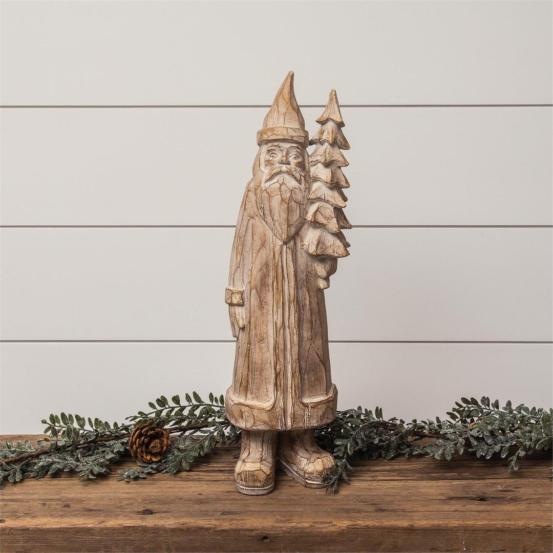 Carved Santa Holding Tree Figurine