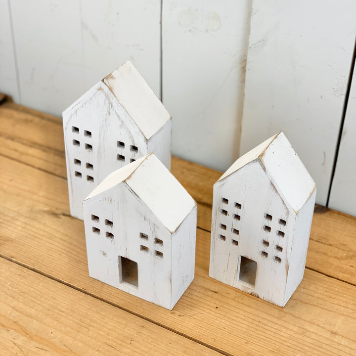 Distressed Wooden Houses with Light Hole