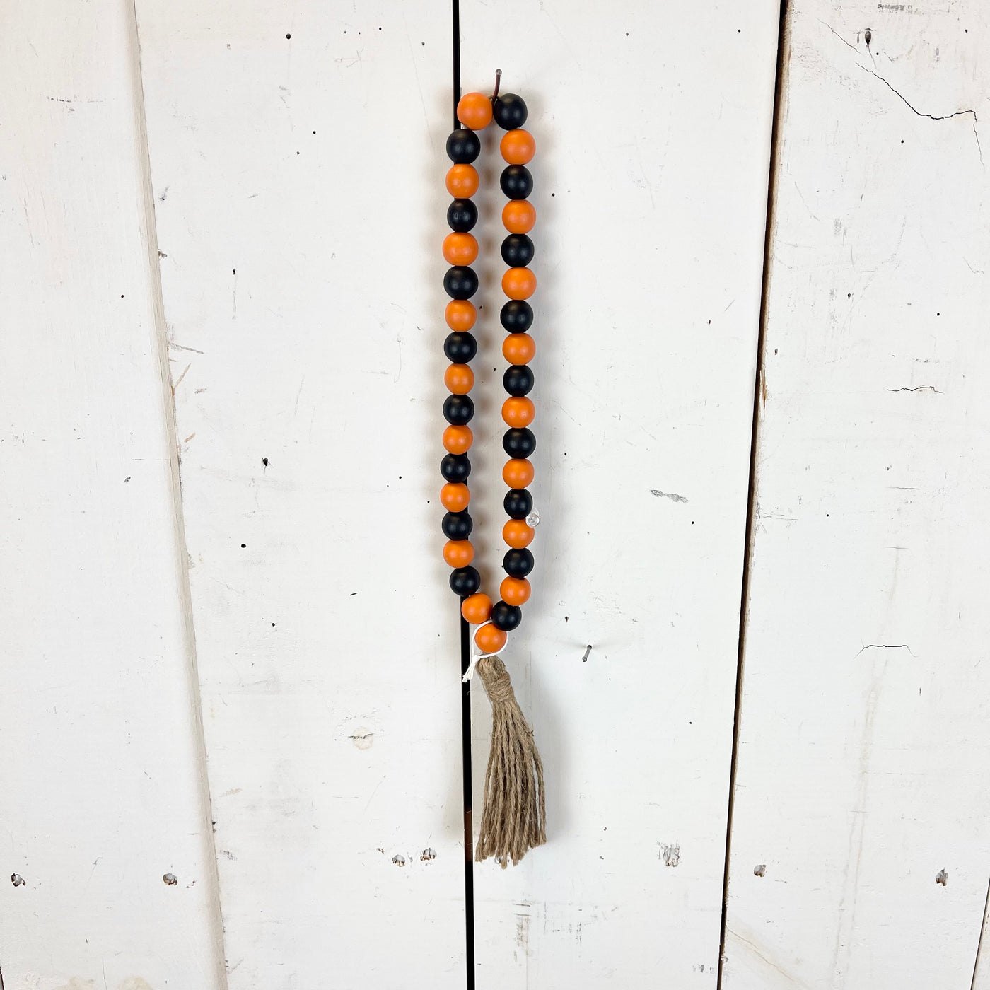 Black and Orange Bead Loop with Tassel