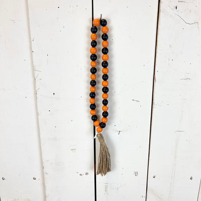 Black and Orange Bead Loop with Tassel