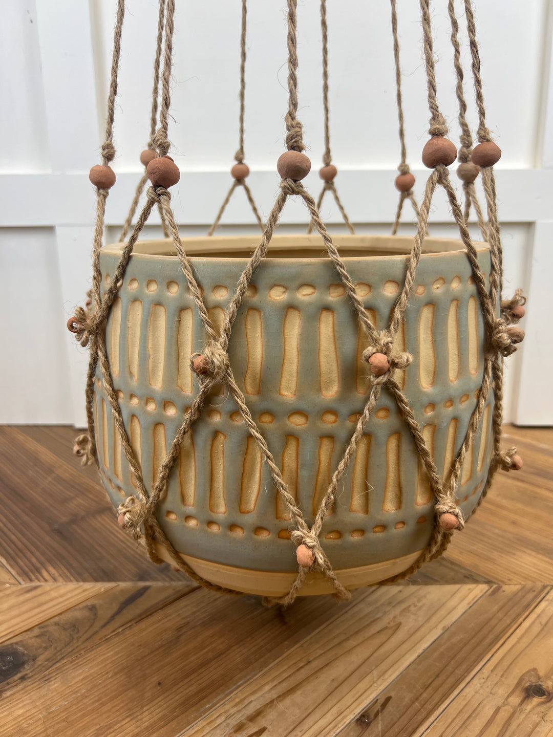 Jute and terracotta beaded plant hanger