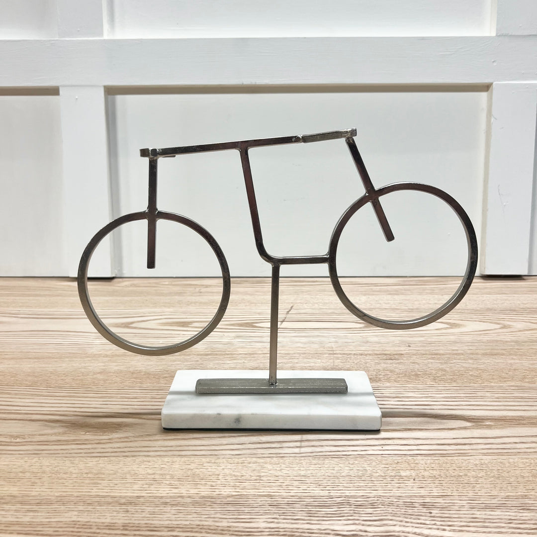 Silver Bicycle Statue