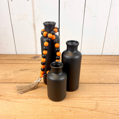 Black and Orange Bead Loop with Tassel
