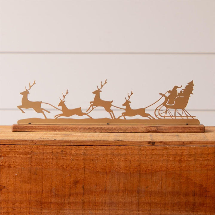 Santa And Reindeer Gold Silhouette