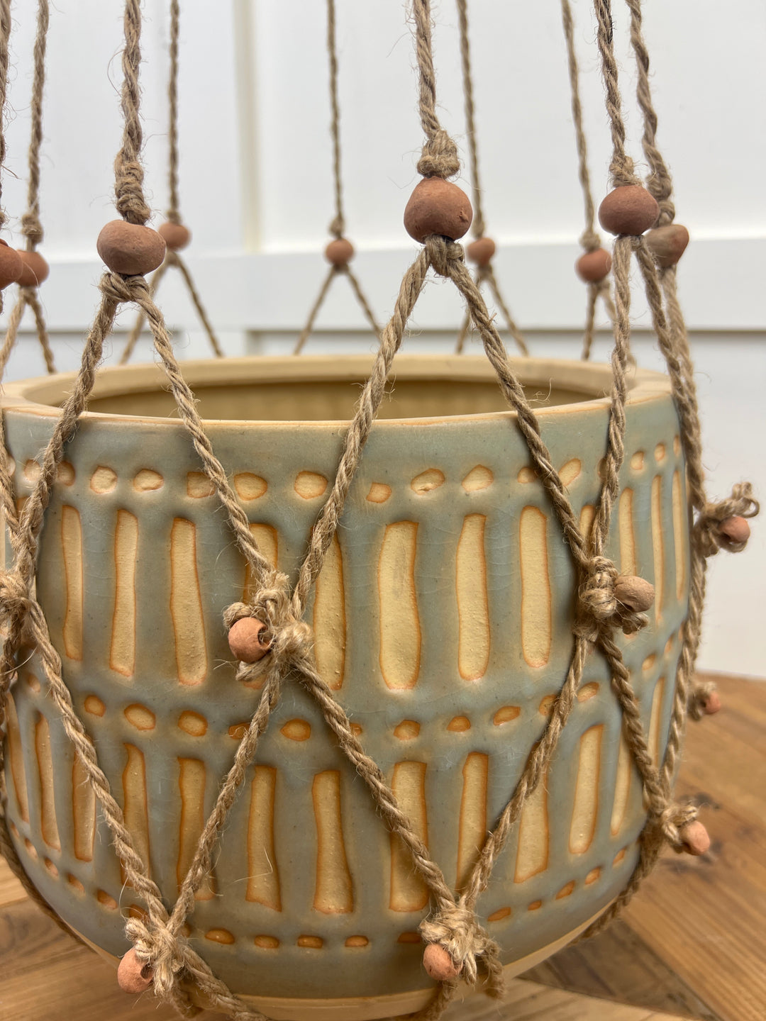 Jute and terracotta beaded plant hanger