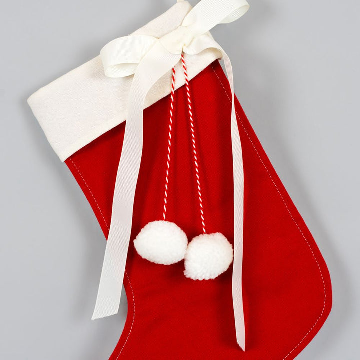 Red Canvas Stocking with Pom Poms