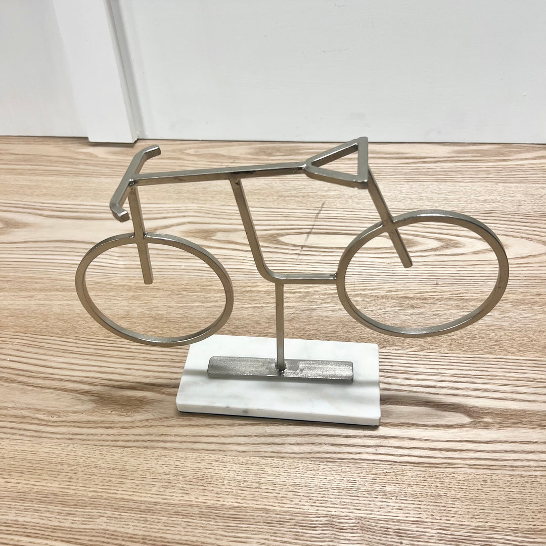 Silver Bicycle Statue