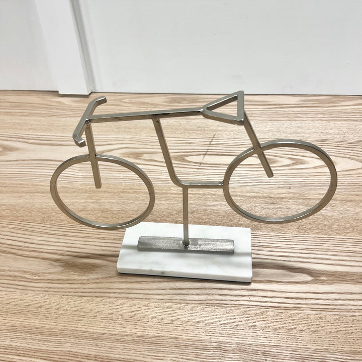 Silver Bicycle Statue