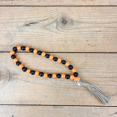Black and Orange Bead Loop with Tassel