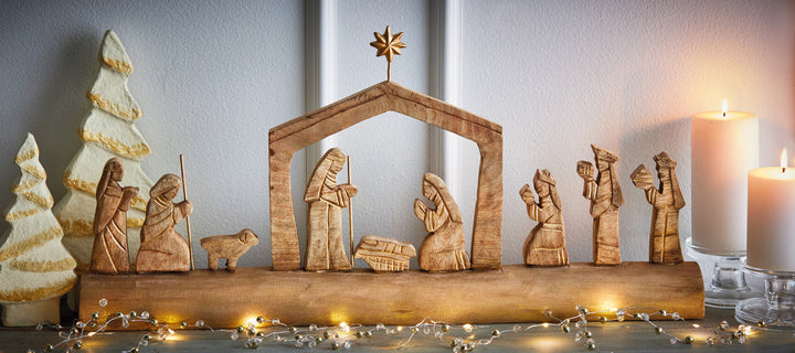 Nativity Scene On Carved Wood Log