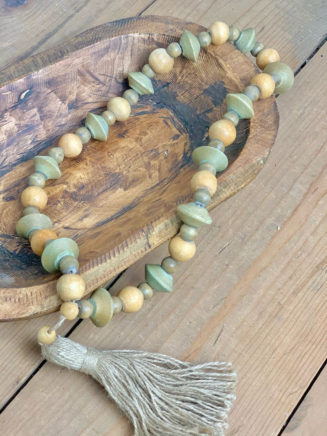 Wood Bead Strand With Tassel