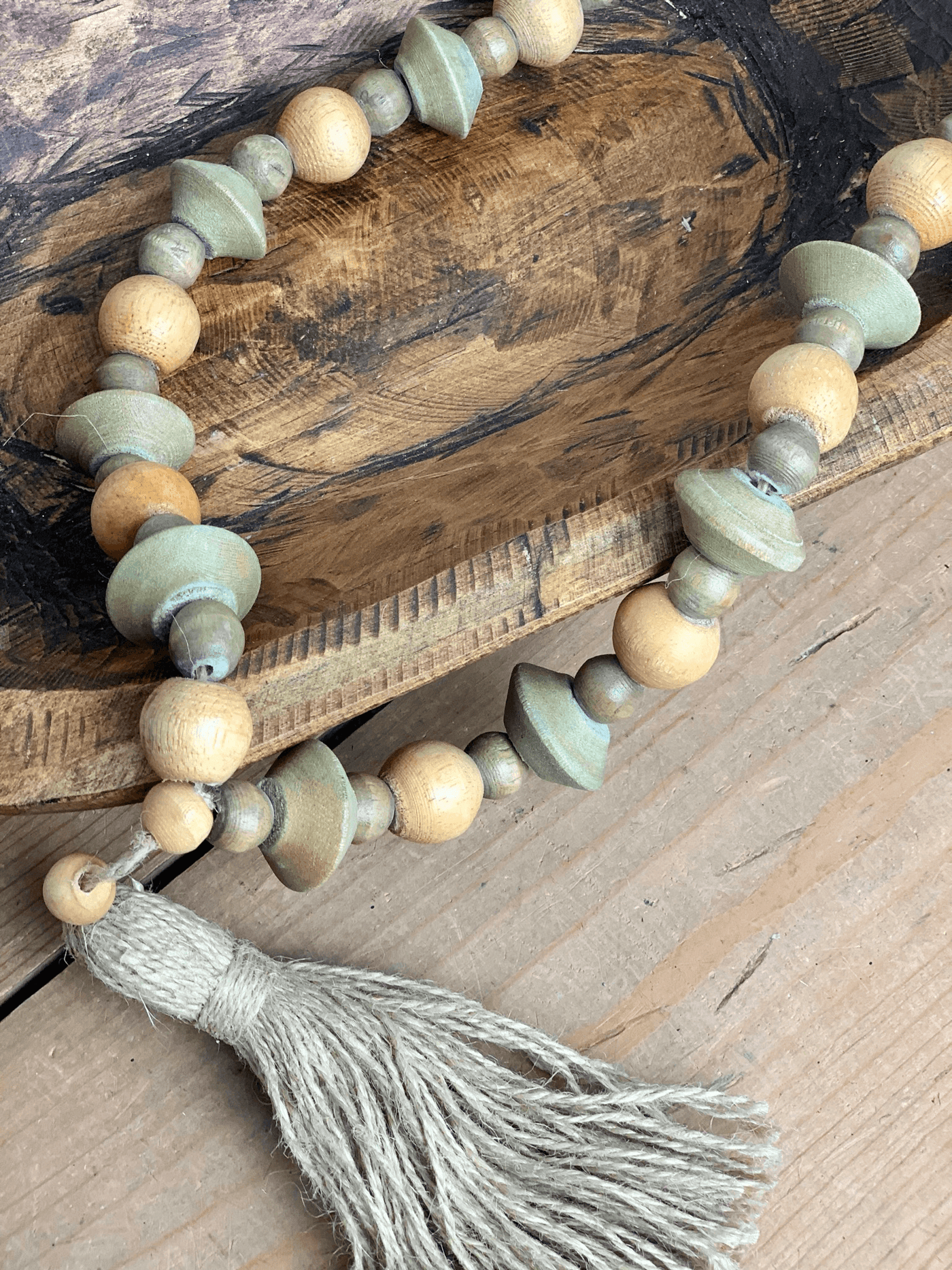 Wood Bead Strand With Tassel
