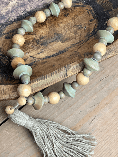 Wood Bead Strand With Tassel