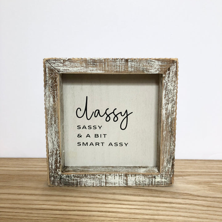 Classy, sassy, and a bit…” Signage